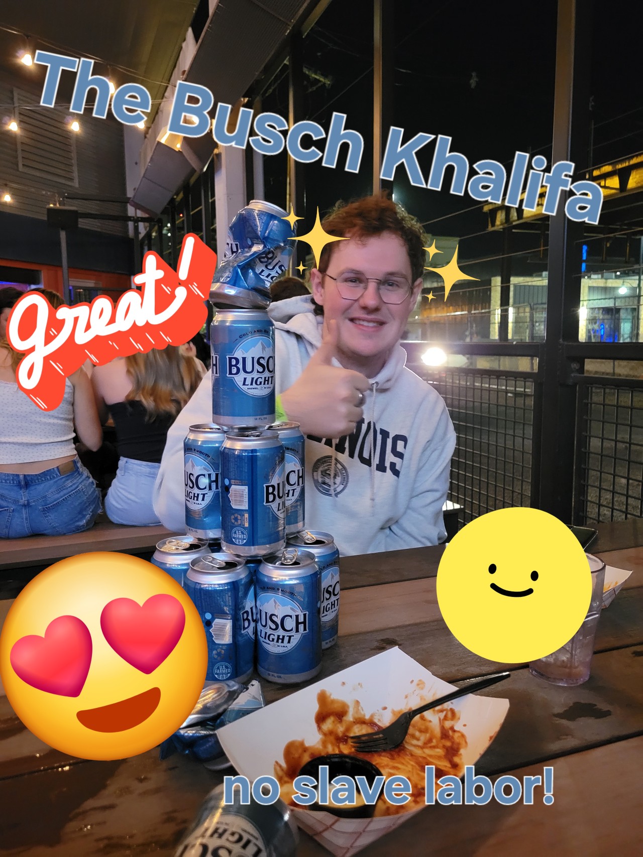 Ian with a big tower of empty Busch Light cans